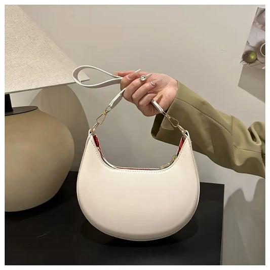 C - borsa elegante mezzaluna